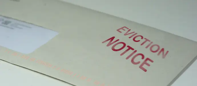 Envelope with eviction notice stamped on it