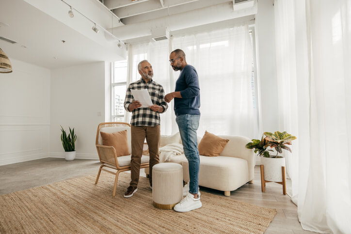 Landlord and tenant discussing rent