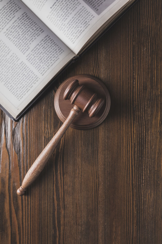 HOA Dispute Lawyer Tampa, FL-2 - gavel on wood desk with law book