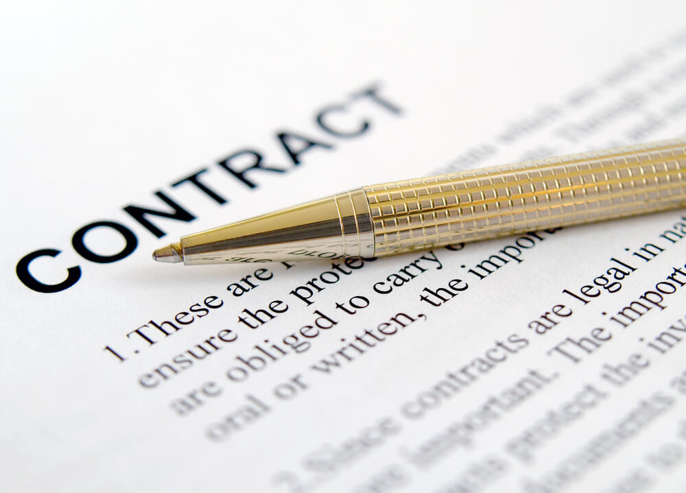 HOA Lawyer Miami, FL - Pen on the contract papers